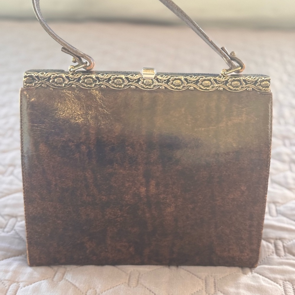 Vintage Brown Leather Clutch with Ornate Metal Frame